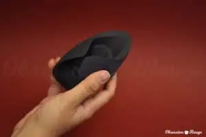 Woman holding guybrator / vibrator for men