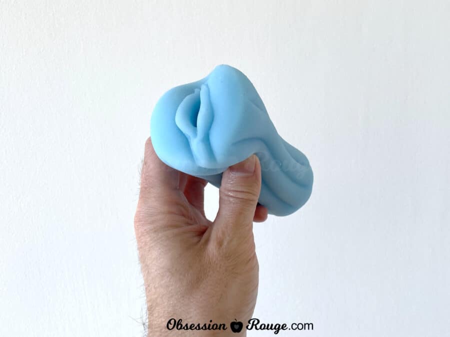 holding the firefly yoni masturbator